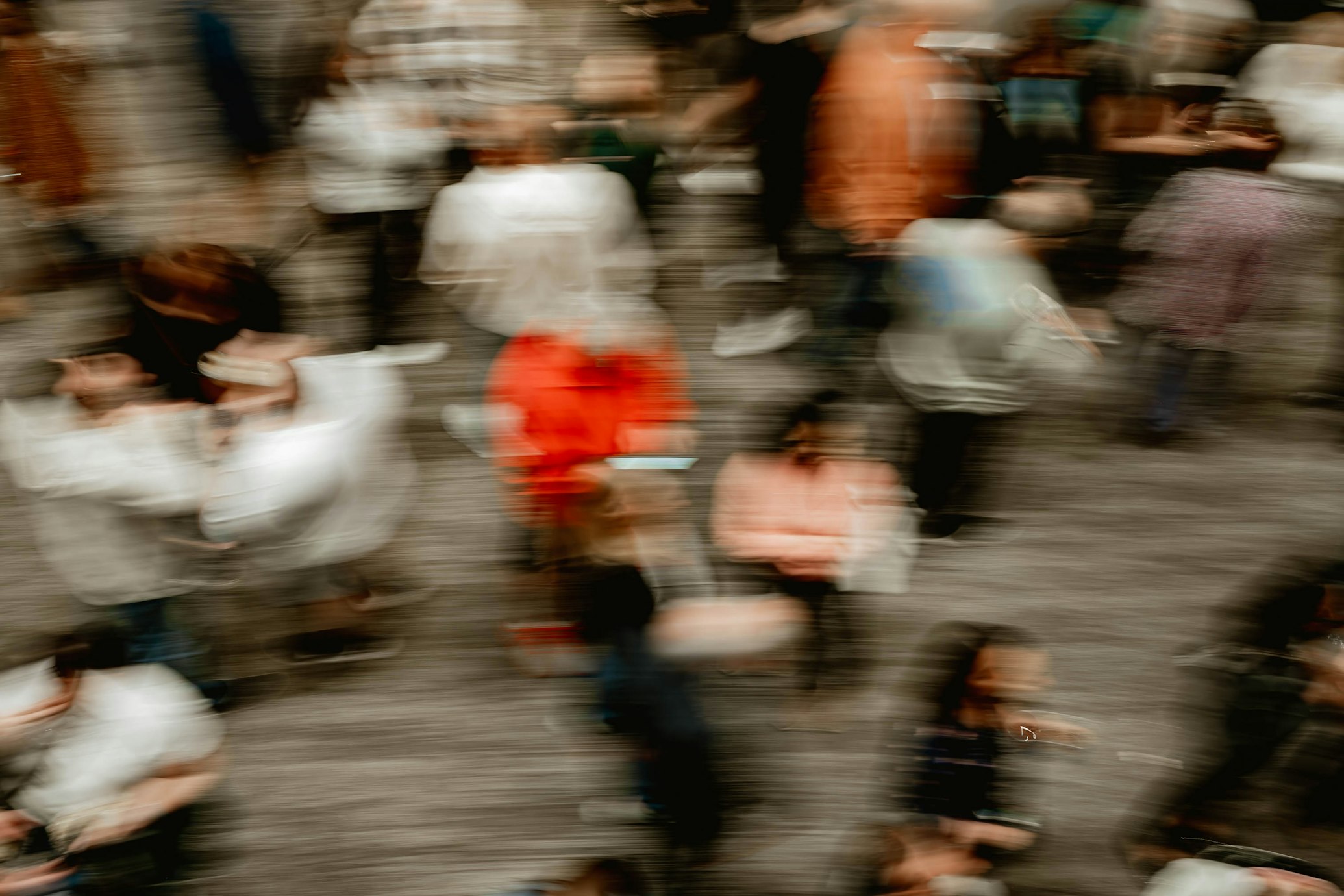 People moving through a busy shared space