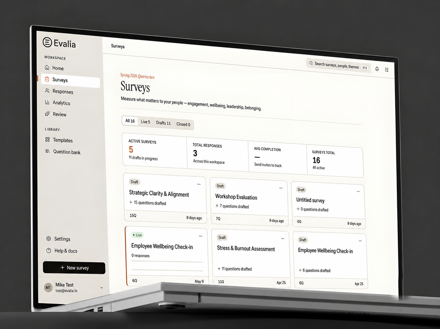 Evalia survey dashboard displayed on a laptop